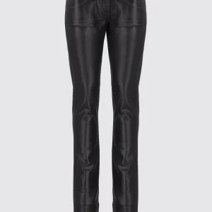 Jeans spalmati effetto pelle